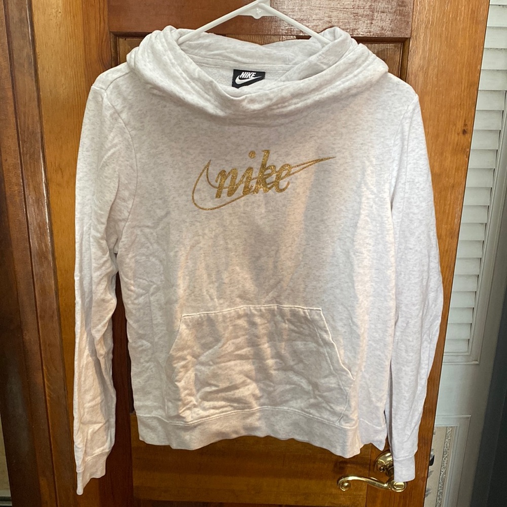 Nike light gray hoodie with gold writing